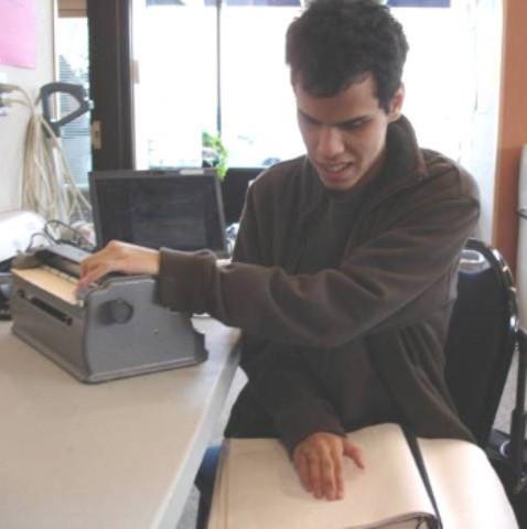 student using brailler 